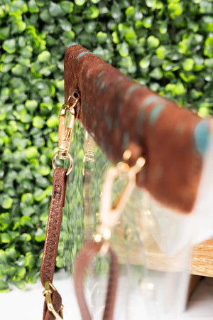 IN THE CLEAR TANNER COW ENVELOPE CLUTCH